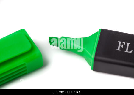 Green Highlighter Pen and Matching Lid on White Background Stock Photo