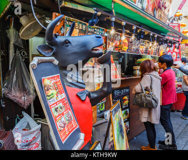 KOBE, JAPAN - NOVEMBER 17: Kobe grilled beef in Kobe, Japan on November 17, 2013. Famous for the Kobe beef, Nankinmachi has many grilled beef stall pr Stock Photo