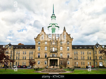 The Trans-Allegheny Lunatic Asylum was a Kirkbride psychiatric hospital that operated from 1864 until 1994 in Weston, West Virginia, USA.  It was desi Stock Photo