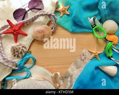 Summer vacation background travel to the sea with the accessories on the wood surface. Stock Photo