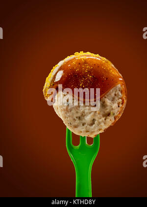 isolated; fork; ketchup; meat; sausage; food; sauce; curry; currywurst; bude; eat; cut; fast; greasy; german; bratwurst; spice; shop; specialty; unhea Stock Photo