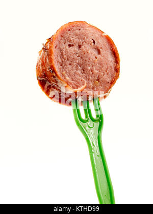 isolated; fork; ketchup; meat; sausage; food; sauce; curry; currywurst; bude; eat; cut; fast; greasy; german; bratwurst; spice; shop; specialty; unhea Stock Photo