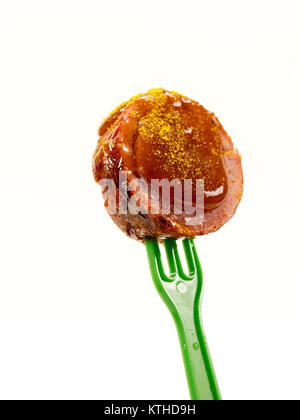 isolated; fork; ketchup; meat; sausage; food; sauce; curry; currywurst; bude; eat; cut; fast; greasy; german; bratwurst; spice; shop; specialty; unhea Stock Photo