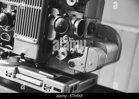 Vintage film projector, close up black and white photo with selective focus Stock Photo