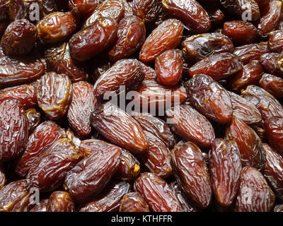 pile of dates , dried date fruits closeup Stock Photo