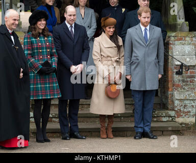 Britain's Queen Elizabeth leads the British royal family as they attend a Christmas service at St Mary Magdalene church on the Sandringham Estate in Norfolk. Prince Harry's girlfriend American actress Meghan Markle attended the service having been invited by the Queen to join the family Christmas festivities. Stock Photo