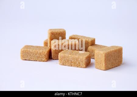 Brown sugar cubes Stock Photo