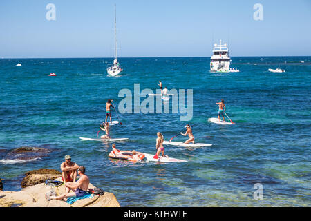 SYDNEY, AUSTRALIA-DEC 21, 2014 :People relaxing at Manly beach in Sydney, Australia on Dec 21. 2014 .Manly beach is one of a famous beach in the world Stock Photo