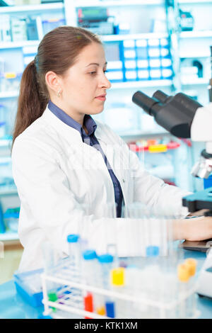 young woman lab assistant in a genetics lab Stock Photo