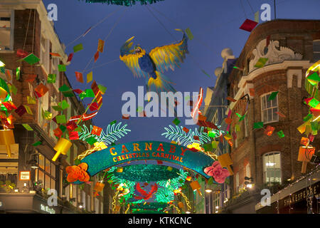 LONDON - DECEMBER 18, 2017: Christmas lights on Carnaby Street, London UK. Carnaby Christmas lights feature some of the most unusual decorations and l Stock Photo