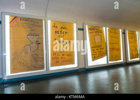 Paris, France, Anti French Advertising Protest, Metro Subway Posters , in Hallway of Invalides Station, activist art protest Stock Photo