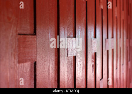 red wooden wall of traditional Thai house Stock Photo