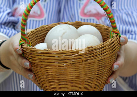 pile of duck eggs in the wicker baskets Stock Photo