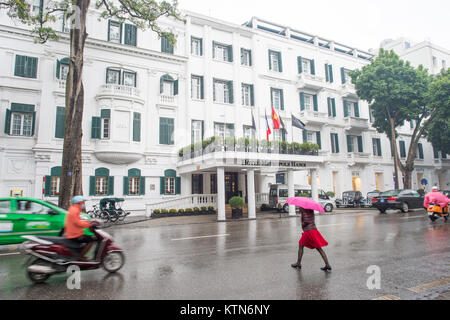 Metropole Hotel in Hanoi on a rainy day in February. This legendary  hotel built in French colonial style the hotel opened in 1901. Stock Photo
