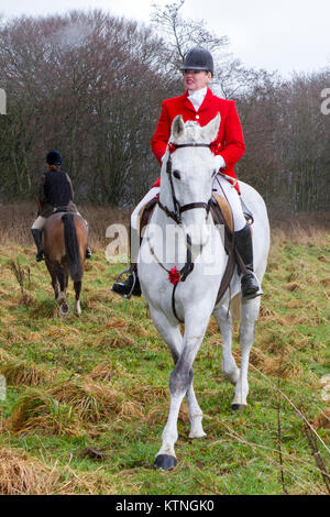Rivington Barn, Lancashire, UK. 26th Dec, 2017. The Rivington Boxing Day Hunt, Chorley, Lancashire.  26th December 2017. Thousands of people attend the traditional Boxing Day hunt meeting at Rivington Barn in Lancashire.  Hunting with dogs was outlawed eight years ago, but many legal ‘hunts’ still continue.  Horses and riders follow scented trails on a display of pomp and ceremony after Christmas.  The Masters of Foxhounds Association have more than 200 meets listed across the country, including the annual Boxing Day hunt in Horwich, near Bolton. Credit: Cernan Elias/Alamy Live News Stock Photo