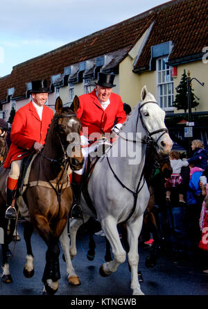 Thornbury, UK. 26th Dec, 2017. The Berkely fox hunt meet and canter through the High Street in Thornbury for the annual boxing Day hunt. Many people turn out to see the spectacle which draws visitors from all over the area and Bristol. Credit: Mr Standfast / Alamy Live News Stock Photo