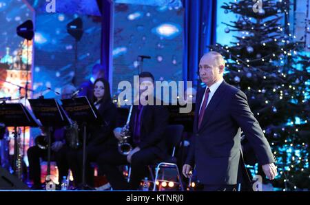 Moscow, Russia. 27th Dec, 2017. Russian President Vladimir Putin arrives for a New Year celebration concert at the State Kremlin Palace December 27, 2017 in Moscow, Russia. Credit: Planetpix/Alamy Live News Stock Photo