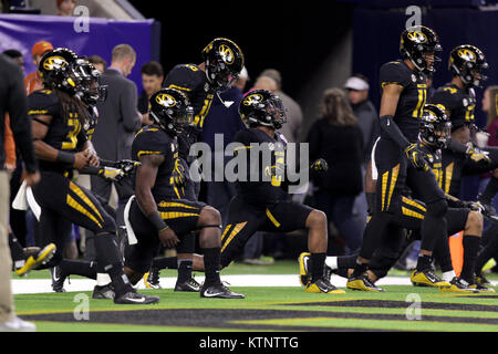 Houston, Texas, USA. 27th Dec, 2017. Members of the Missouri Tigers stretch out prior to the Texas Bowl between the Texas Longhorns and the Missouri Tigers at NRG Stadium in Houston, TX on December 27, 2017. Credit: Erik Williams/ZUMA Wire/Alamy Live News Stock Photo