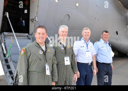 (From left) Cpt. Ryan Daughtery, Col. Thomas McEntee, C-17 pilot and 105th Airlift Wing Operations Grop commander, Maj. Gen. Verle Johnston, the New York Air National Guard commander and South Africa Airforce Col. Jurgens Prinsloo pose in from of the units C-17 Globemaster III, Sept. 20.  The unit is part of a U.S. military contingent displaying aircraft and equipment during the Africa Aerospace and Defense Airshow and Exhibition at the South Africa National Defense Force’s Waterkloof Air Force Base. Stock Photo