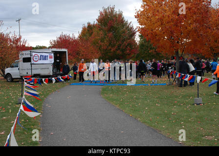 COLONIE NY-- The New York National Guard Family Readiness Council, a non-profit that raises money to help the families of New York Army and Air National Guard members, held its annual Hometown Heroes fundraising 5 K race on Oct. 19 at Crossings of Colonie Park here. Awards were presented to the fastest male and female runners and special recognition was given to participants in a &quot;couch to 5 K &quot; development program. (Division of Military and Naval Affairs Photo by Eric Durr/Released) Stock Photo