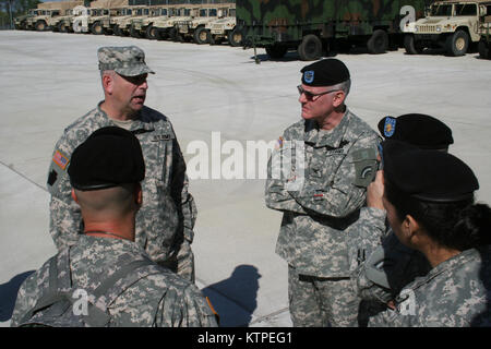 New York Army National Guard Col. Brian Balfe speaks with members of the Pennsylvania Army National Guard's 56th Stryker Brigade Combat Team, part of the 28th Infantry Division. Balfe, the Assistant Division Commander for the 42nd Infantry Division, was part of an orientation visit to the Stryker Brigade Combat Team to learn about the unit's capabilities and employment. Stock Photo