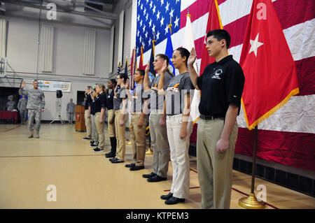 LATHAM --New York Army National Guard Maj. Gen. Patrick Murphy, the adjutant general of New York, conducts an oath reaffirmation ceremony with five New York Army National Guard and five New York Air National Guard recruits during a 378th National Guard birthday celebration held Monday, Dec. 15 at New York State Division of Military and Naval Affairs headquarters in Latham, N.Y. The 10 new members have not yet attended their initial training school and cannot yet wear the uniform. The oath reaffirmation ceremony was coupled with a traditional cake-cutting event. The new recruits family members  Stock Photo