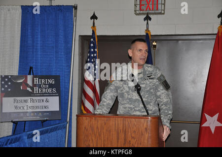 Major General Patrick Murphy, the Adjutant General of New York, speaks during the opening of a Hiring our Heroes job fair sponsored by the U.S. Chamber of Commerce Foundation and hosted by the New York National Guard at New York State Division of Military and Naval Affairs headquarters in Latham, N.Y. on March 5, 2015. (U.S. Army National Guard photo by Master Sgt. Corine Lombardo/Released) Stock Photo