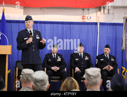 NY Air National Guard Maj. Gen. Anthony P. German, Acting Adjutant General for the state of New York, spoke to the members of the 174th Attack Wing (ATKW) and guests at Hancock Field in Syracuse NY on April 3, 2016.  German was the officiating officer for the change of command ceremony where NY Air National Guard Col. Greg A. Semmel relinquished command of the 174th ATKW to NY Air National Guard Col. Michael R. Smith, formerly the Vice Wing Commander. (NY Air National Guard Photo by Tech. Sgt. Jeremy M. Call) Stock Photo