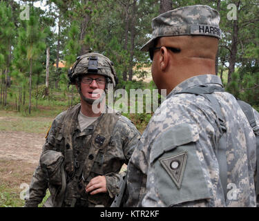 Ohio Army National Guard Maj. Gen. John Harris, Jr., Assistant Adjutant General visits his Soldiers to discuss training at the Army’s Joint Readiness Training Center, Fort Polk, Louisiana, July 27, 2016. Approximately 3,000 Soldiers from New York joined 2,000 other state Army National Guard units, active Army and Army Reserve troops as part of the 27th Infantry Brigade Combat Team’s Task Force Hunter.  The Soldiers are honing their skills and practicing integrating combat operations ranging from infantry troops engaging in close combat with an enemy and employing artillery and aviation, July 9 Stock Photo