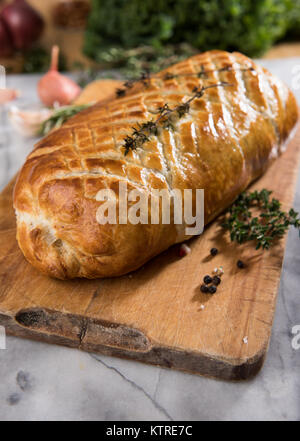 Fresh Homemade Beef Wellington in Flaky Puff Pastry Dough Stock Photo