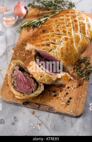 Fresh Homemade Beef Wellington in Flaky Puff Pastry Dough Stock Photo
