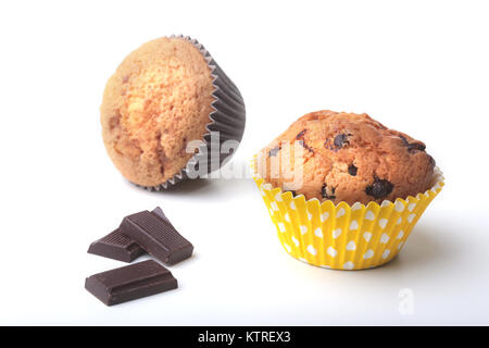 Homemade muffin with raisins and chocolate cupcake. Isolated on white background. selective focus Stock Photo