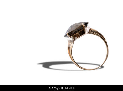 Gold ring with black precious stone isolated on white background. Clipping path is included Stock Photo