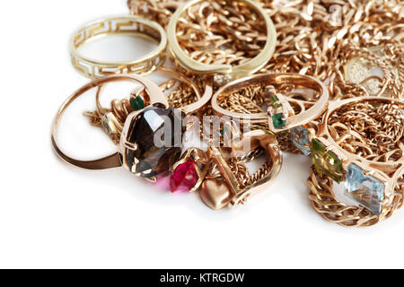 Pile of gold jewelry isolated on white background Stock Photo
