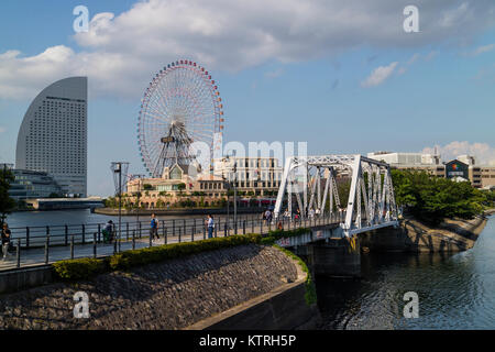 Yokohama - Japan, June 15, 2017 ;  View to Cosmo Clock 21,  a giant Ferris wheel at the Cosmo World amusement park in the Minato Mirai Stock Photo