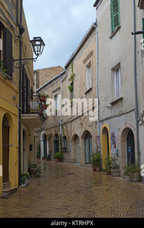 a narrow paved street in the old town of Vasto, Abruzzo region, Italy Stock Photo