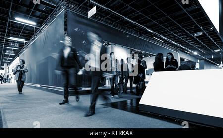 Group of business people at a trade fair Stock Photo