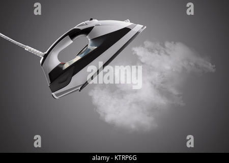 Modern black and white steam iron side view isolated on gray background Stock Photo