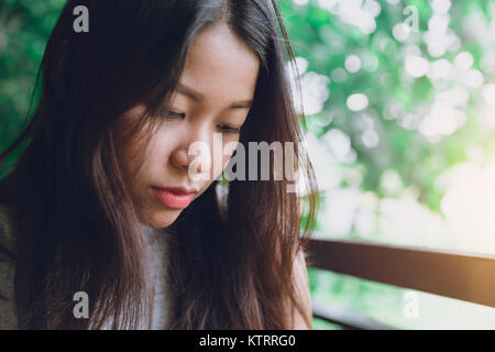 sad still mood of Asian women portrait closeup face with space for text Stock Photo