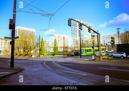 Portland, Oregon, United States - Dec 20, 2017 : Portland Streetcar, that opened in 2001 and serves areas surrounding downtown Portland. Near by Orego Stock Photo