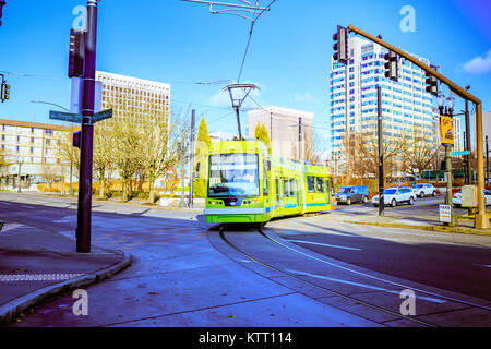 Portland, Oregon, United States - Dec 20, 2017 : Portland Streetcar, that opened in 2001 and serves areas surrounding downtown Portland. Near by Orego Stock Photo