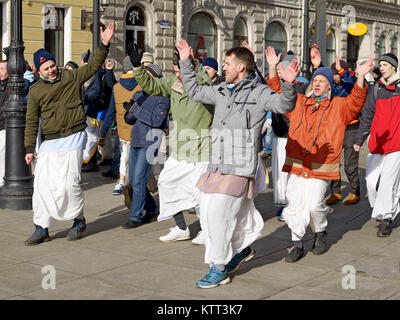 12.03.2017.Russia.Saint-Petersburg.On the street gathered followers of Lord Krishna.Young people are dancing,collecting alms and distributing sweets. Stock Photo