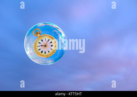 Stopwatch inside a floating soap bubble Stock Photo
