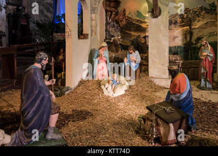 Christmas Manger scene with figurines including Jesus, Mary, Joseph and Magi Stock Photo