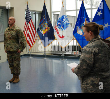 Chief Warrant Officer 2 Matthew Starr during his promotion ceremony on March 31, 2017 at New York National Guard headquarters in Latham, N.Y. Starr works in the New York National Guard federal personnel office. ( U.S. Army National Guard photo by Eric Durr) Stock Photo