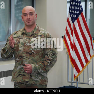 Chief Warrant Officer 2 Matthew Starr during his promotion ceremony on March 31, 2017 at New York National Guard headquarters in Latham, N.Y. Starr works in the New York National Guard federal personnel office. ( U.S. Army National Guard photo by Eric Durr) Stock Photo