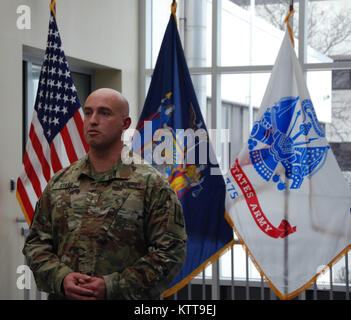 Chief Warrant Officer 2 Matthew Starr during his promotion ceremony on March 31, 2017 at New York National Guard headquarters in Latham, N.Y. Starr works in the New York National Guard federal personnel office. ( U.S. Army National Guard photo by Eric Durr) Stock Photo