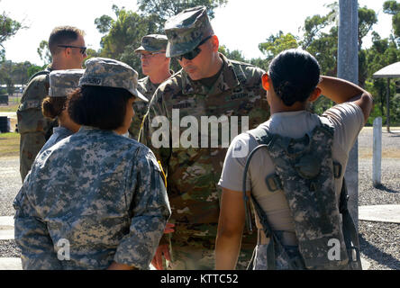 SHOALWATER BAY, Queensland, Australia – Brig. Gen. Joseph Biehler, the 42nd Infantry Division deputy commander, tours camp Samuel Hill and meets with 27th Infantry Brigade Combat Team Soldiers participating in Combined Exercise Talisman Saber, July 18. More than 700 New York Army National Guard Soldiers are participating in the exercise, a joint training mission between the Australian, Zew Zealand, and United States military. (U.S. Army National Guard photo by Sgt. Alexander Rector) Stock Photo