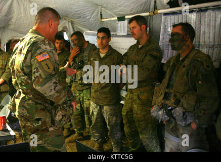 SHOALWATER BAY, Queensland, Australia – Brig. Gen. Joseph Biehler, the 42nd Infantry Division deputy commander tours the 1st Battalion, 69th Infantry Regiment's command post during Combined Exercise Talisman Saber, July 18. During the exercise, more than 700 New York Army National Guard Soldiers traveled to Australia to participate in the multi-national training event. (U.S. Army National Guard photo by Sgt. Alexander Rector) Stock Photo