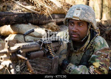 Sergeant Kenny King, of the 1st Battalion 69th Infantry Regiment, New York Army National Guard, prepares to face Australian soldiers and US Marines as an enemy during the final assault at the Shoalwater Bay Training Area during Exercise Talisman Saber on 20 July. Stock Photo